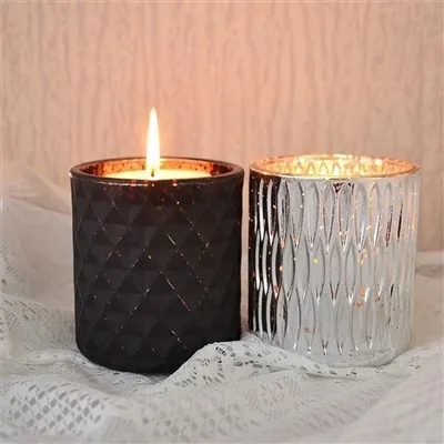 Ljusburkar i bärnstensglas