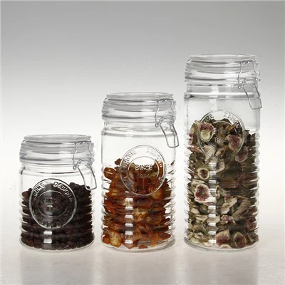 Anpassad godisburk i glas med lock av glas