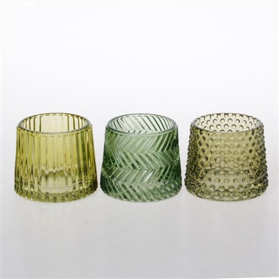 Gula medelstora ljusstakar i glas